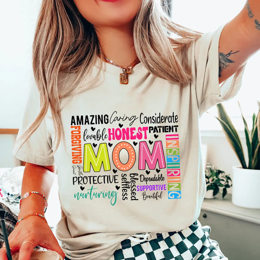 DTF Transfers ready to press – colorful MOM design surrounded by words like patient, caring, inspiring. Great for custom t-shirts and Mother’s Day gifts.