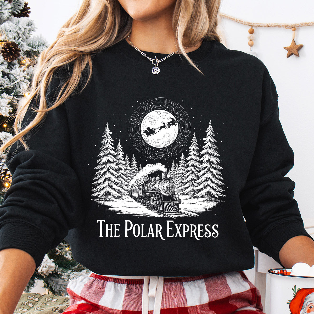 Sweatshirt featuring a Christmas-themed DTF transfer.