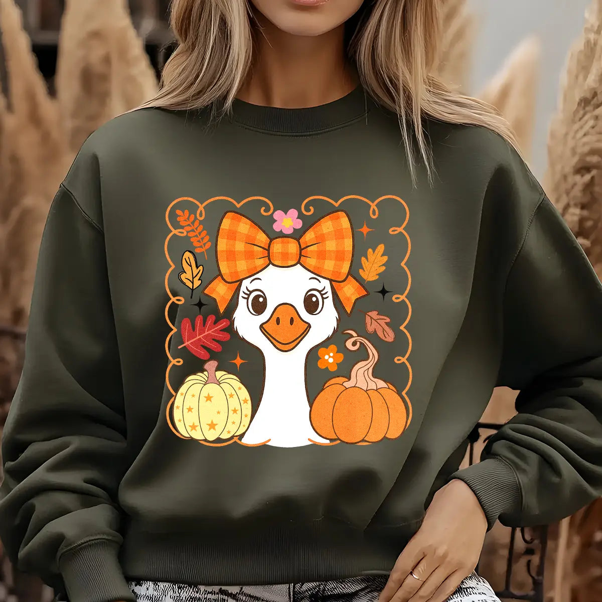 Sweatshirt featuring a Christmas-themed DTF transfer.