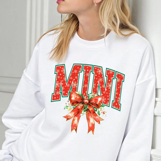 Sweatshirt featuring a Christmas-themed DTF transfer.