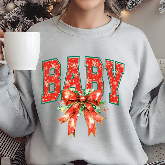 Sweatshirt featuring a Christmas-themed DTF transfer.