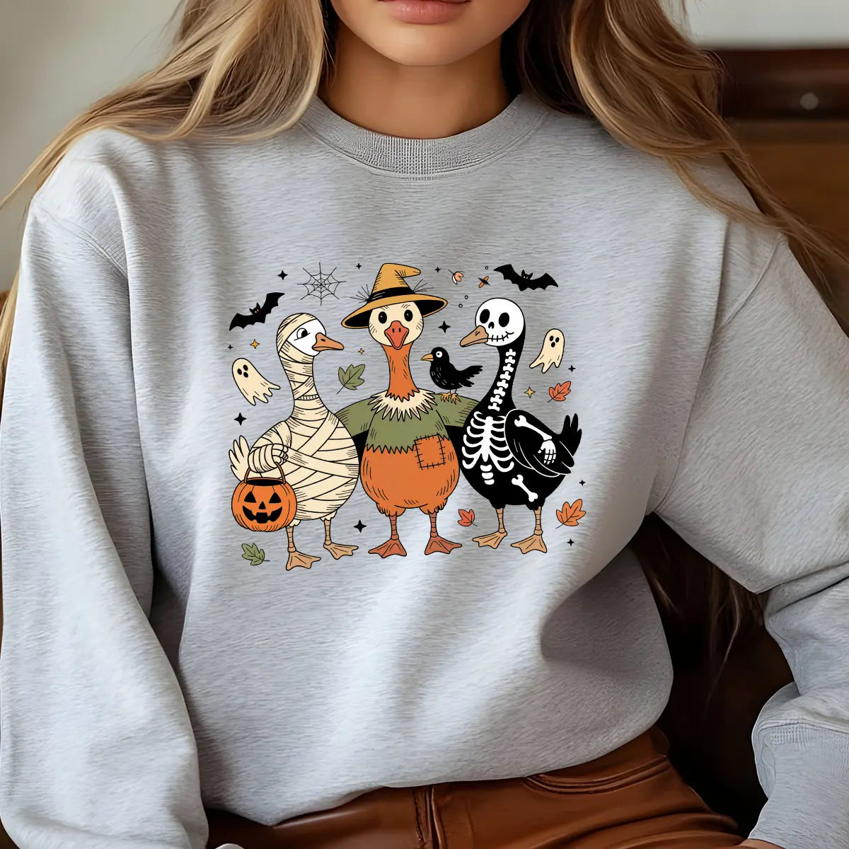 Sweatshirt featuring a Halloween-themed DTF transfer.