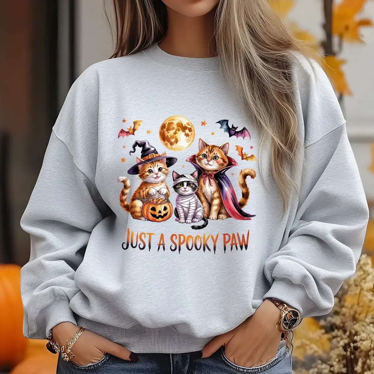 Sweatshirt featuring a Halloween-themed DTF transfer.