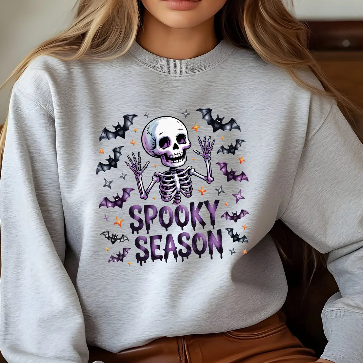 Sweatshirt featuring a Halloween-themed DTF transfer.