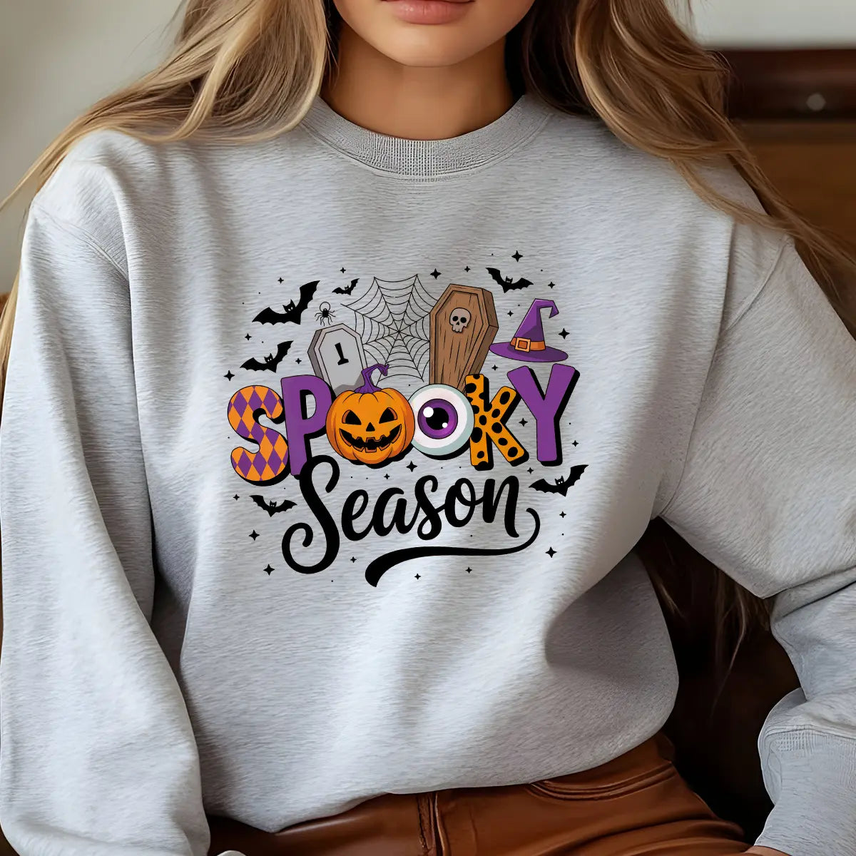 Sweatshirt featuring a Halloween-themed DTF transfer.