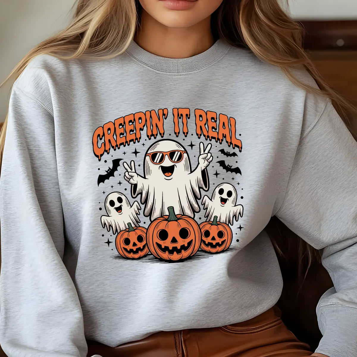 Sweatshirt featuring a Halloween-themed DTF transfer.
