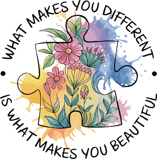 Floral watercolor puzzle piece DTF transfer design with surrounding text reading “What Makes You Different Is What Makes You Beautiful” for autism awareness.