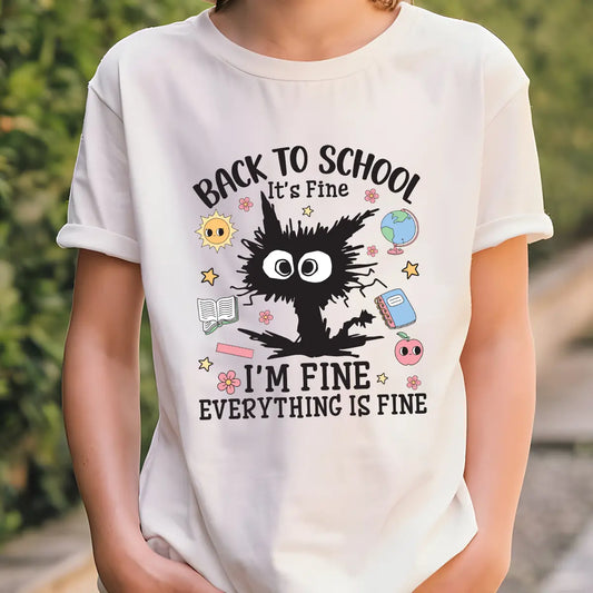 White T-shirt with black frazzled cartoon and “Back to School. It’s Fine. I’m Fine. Everything is Fine” text plus school-themed icons.