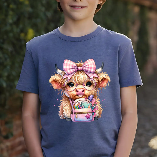 Navy-blue T-shirt with “Back-to-School Highland Cow” DTF transfer design featuring a cute cow with glasses and pink bow holding a pastel school backpack.