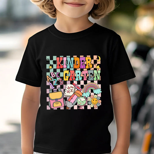 Black T-shirt with “Kindergarten” DTF transfer design featuring colorful checkered background, school icons, rainbow, and bright lettering.