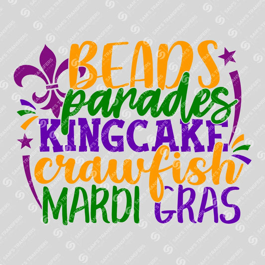 Apparel featuring a Beads Parades Kingcake Crawfish Mardi Gras-themed DTF transfer.