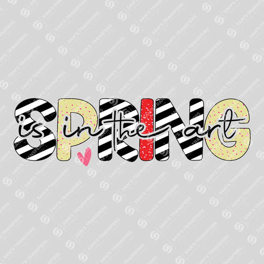 Apparel featuring a Spring Is in the Art Stripes-themed DTF transfer.