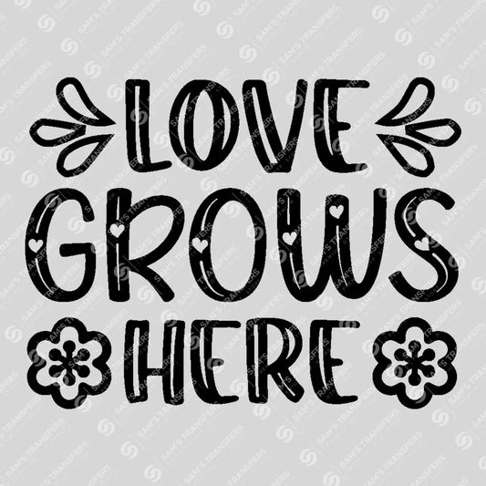 Apparel featuring a Love Grows Here Doodle-themed DTF transfer.
