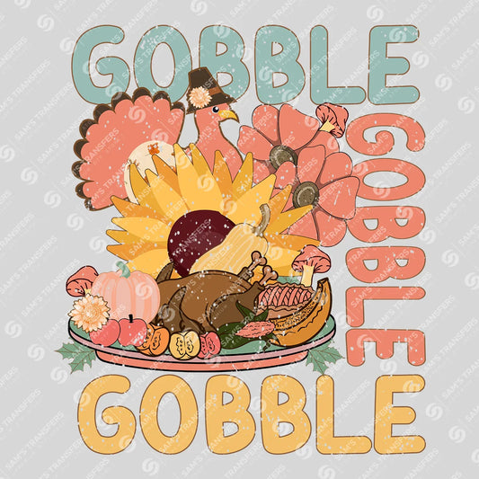 Apparel featuring a Gobble Gobble Gobble-themed DTF transfer.