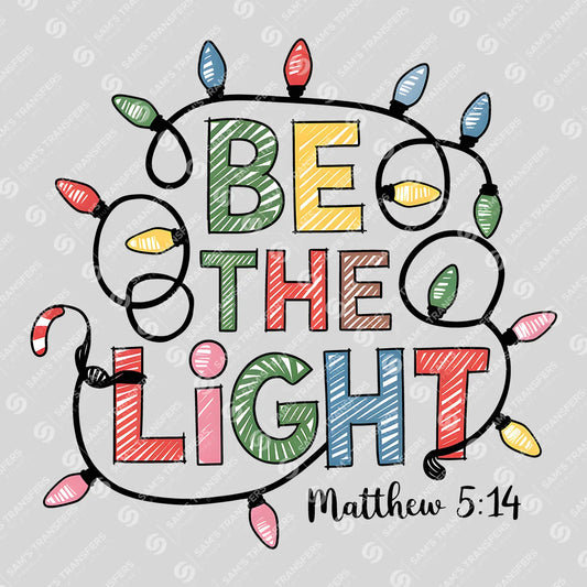 Apparel featuring a Be the Light-themed DTF transfer.