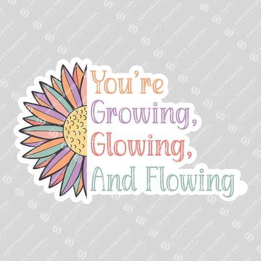 Apparel featuring a You're Growing Glowing and Flowing-themed DTF transfer.