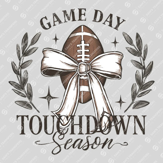Apparel featuring a Game Day Touchdown Season Bow-themed DTF transfer.