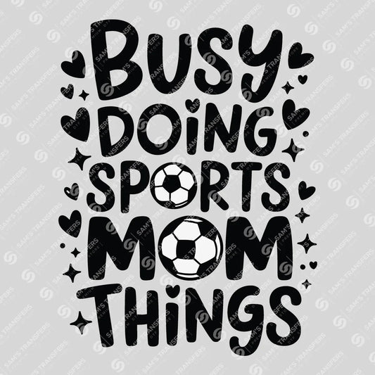 Apparel featuring a Busy Doing Sports Mom Things-themed DTF transfer.