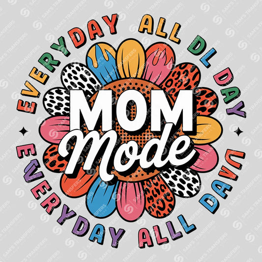 Apparel featuring a Mom Mode-themed DTF transfer.