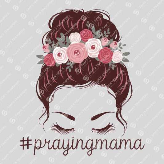 Apparel featuring a Praying Mama-themed DTF transfer.