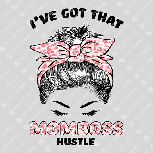 Apparel featuring a Momboss Hustle Pink-themed DTF transfer.