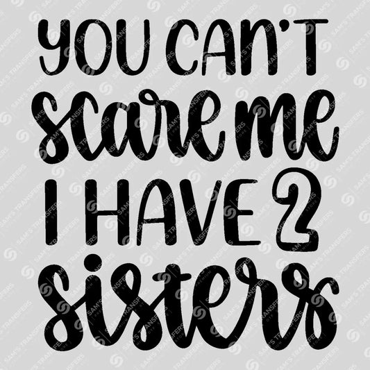 Apparel featuring a You Can't Scare Me I Have 2 Sisters-themed DTF transfer.