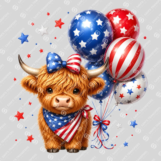 Apparel featuring a 4th of July Highland Cow-themed DTF transfer.