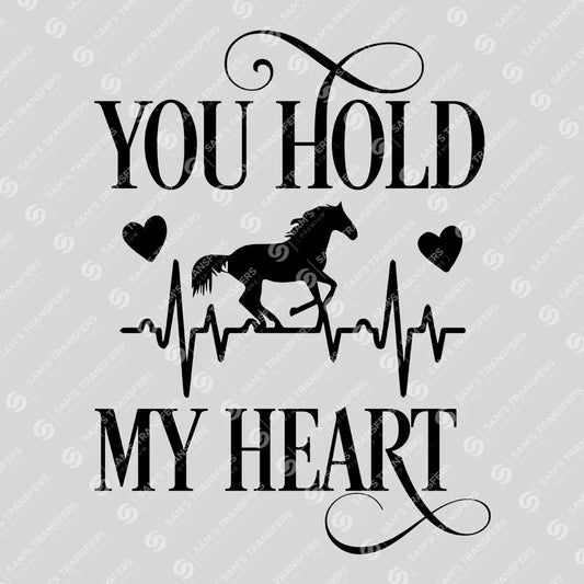 Apparel featuring a You Hold My Heart-themed DTF transfer.