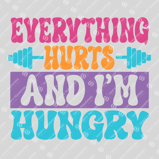 Apparel featuring a Everything Hurts And I'm Hungry-themed DTF transfer.
