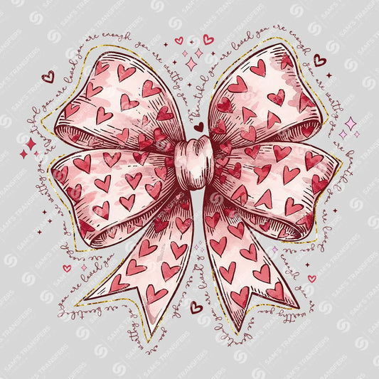 Apparel featuring a Valentine Heart Bow-themed DTF transfer.