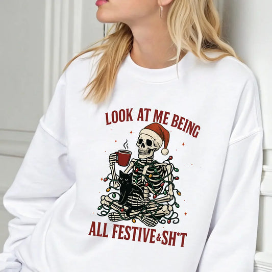 Sweatshirt featuring a Christmas-themed DTF transfer.
