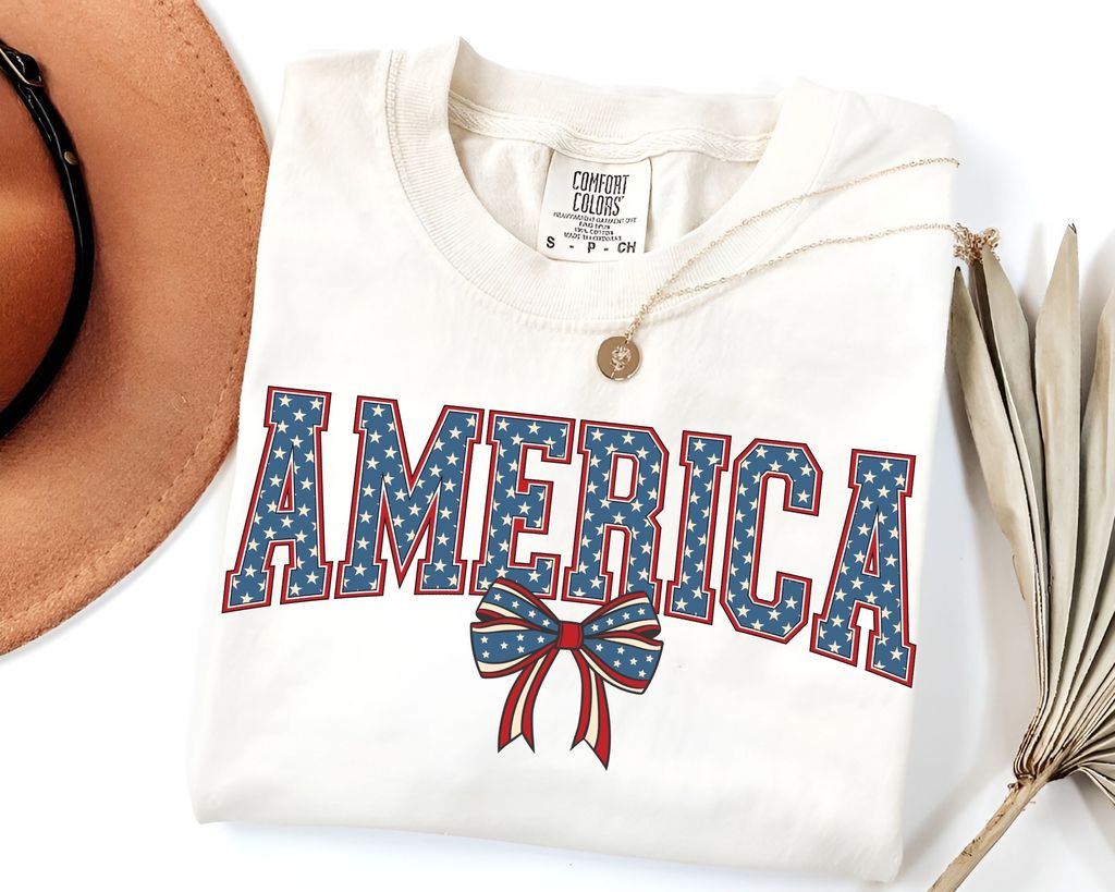 "America Bow" 4th of July DTF Transfer featuring bold collegiate-style America text with a star-spangled bow.