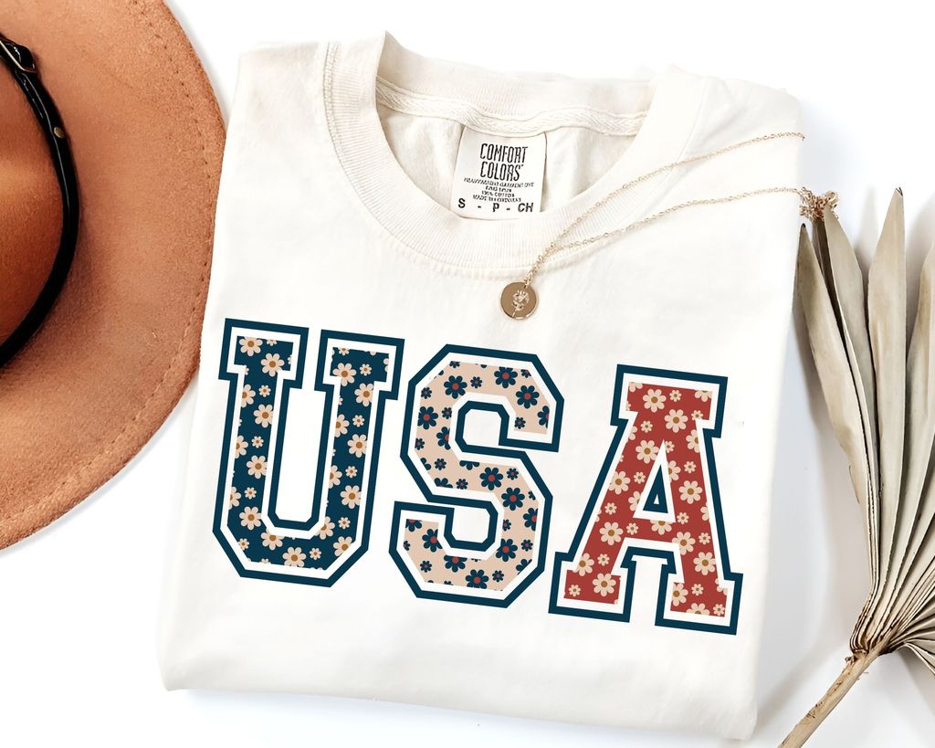 "Floral USA" 4th of July DTF Transfer featuring a bold collegiate-style USA design with a patriotic floral pattern.