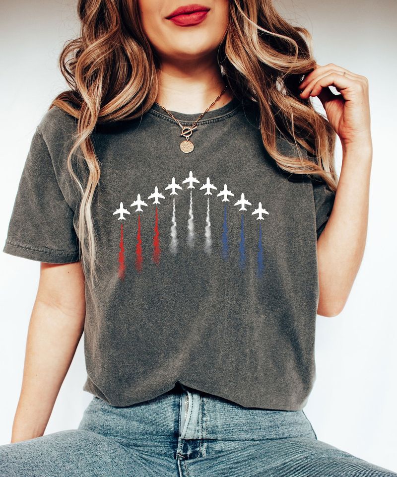 Patriotic Jet Formation 4th of July Ready-to-Press DTF Transfer on a faded black t-shirt.