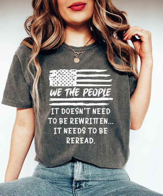 We The People - 4th of July Ready-to-Press DTF Transfer on a dark-colored t-shirt featuring a distressed American flag and a powerful statement.