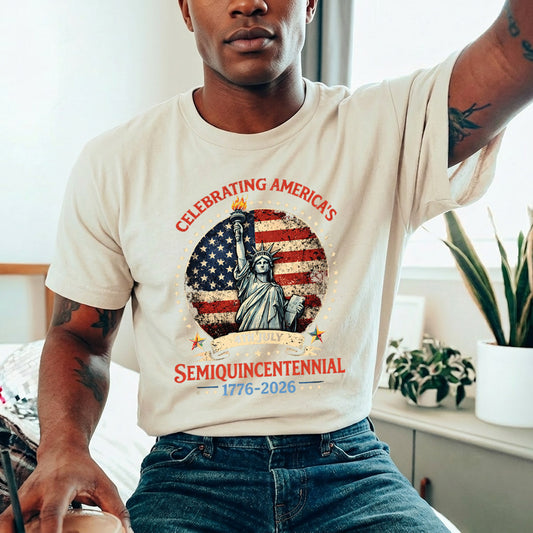 Person wearing a t-shirt celebrating America's Semiquincentennial with an American flag and Statue of Liberty graphic.