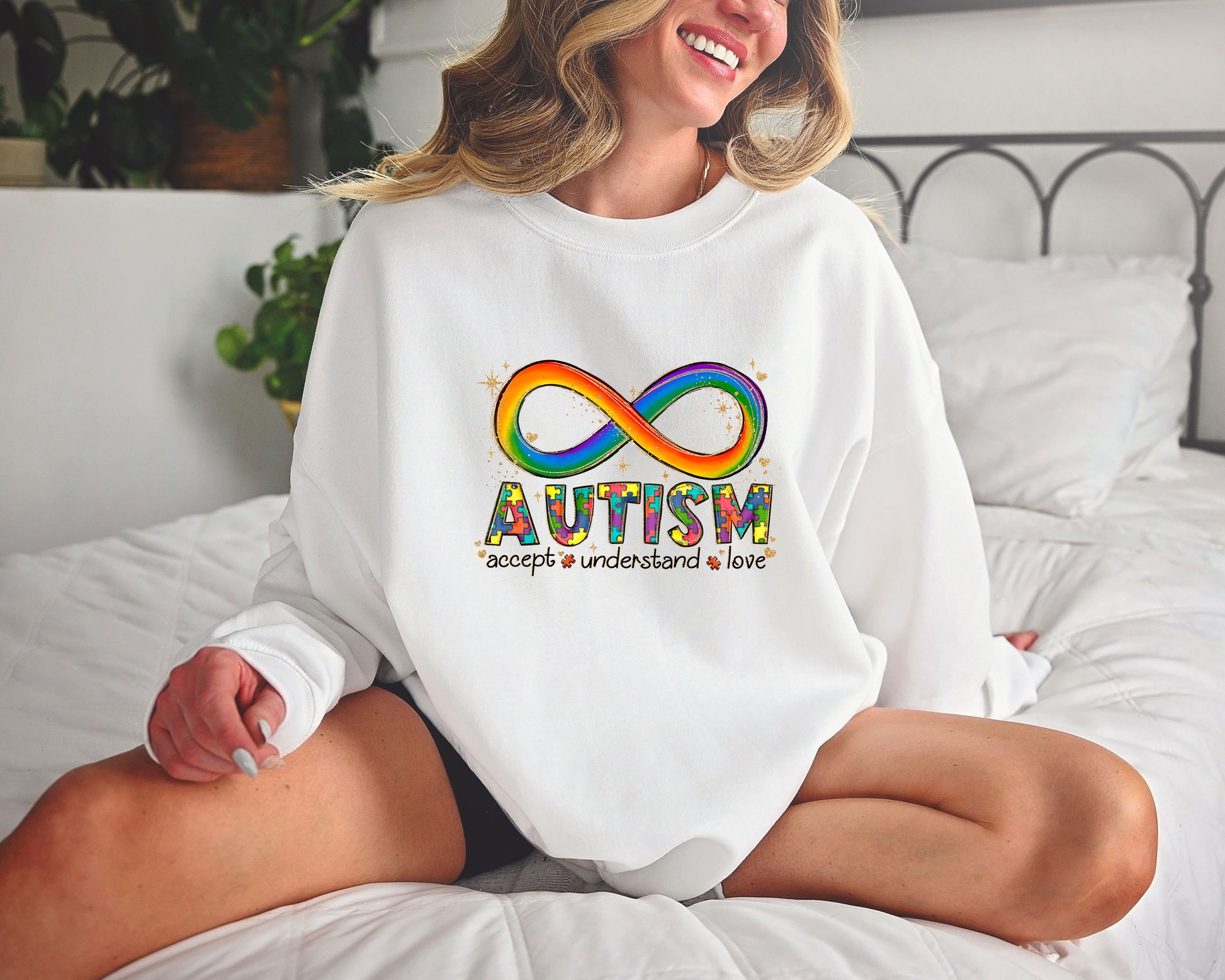 Autism awareness ready-to-press DTF transfer with rainbow infinity design and phrase "accept, understand, love."