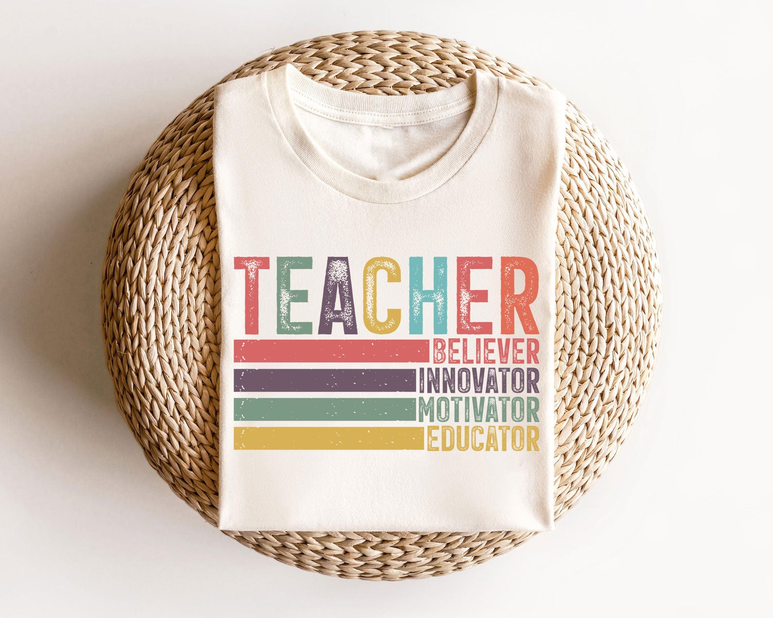 Retro-style teacher-themed DTF transfer on a white t-shirt with motivational text.