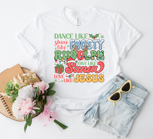 Colorful Christmas DTF transfer with phrases like 'Dance like Frosty' and 'Love like Jesus' on a white t-shirt