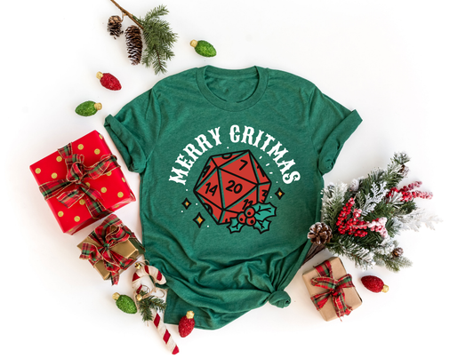 Green t-shirt with 'Merry Critmas' DTF transfer featuring a D20 dice and holiday decorations