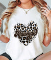 White shirt featuring a leopard print heart with bold “Mawmaw” text in brown script, ideal for custom grandma apparel.

