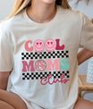 DTF Transfers ready to press – Cool Moms Club retro smiley face design with checkerboard and disco ball accents on cream t-shirt.