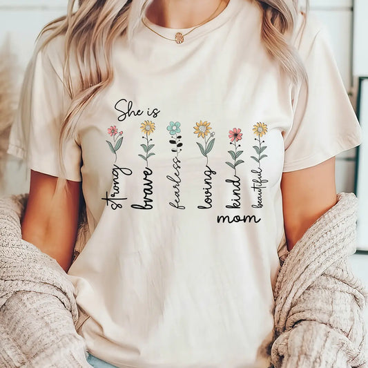 DTF Transfers ready to press – floral mom quote "She is strong brave fearless loving kind beautiful" design on t-shirt for heartfelt gifting and boutique apparel.