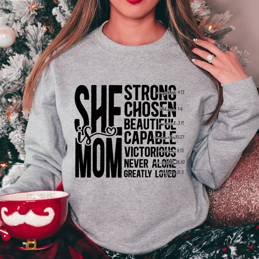 DTF Transfers ready to press – bold “She is Mom” design with empowering Bible verse affirmations for faith-based apparel and Mother's Day gifts.