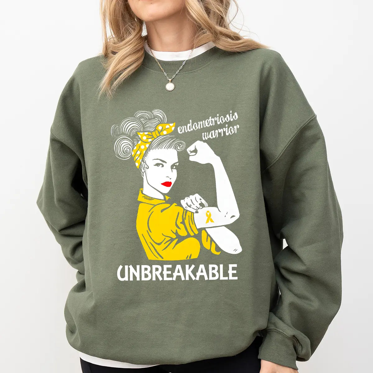 DTF Transfers ready to press – Endometriosis Warrior Rosie-style design with yellow ribbon tattoo and “Unbreakable” text, perfect for awareness and support apparel.