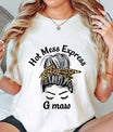Messy bun with leopard-print bandana and “Hot Mess Express G-maw” slogan DTF Transfer design on white t-shirt.