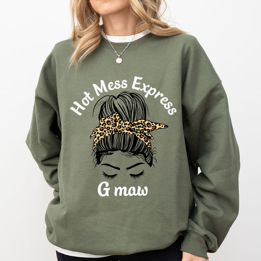Olive-green sweatshirt mockup with messy bun and leopard-print bandana “Hot Mess Express G maw” DTF Transfer design.