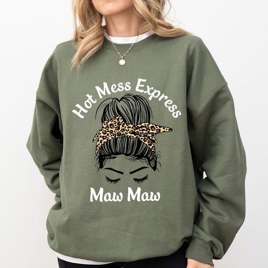 Olive-green sweatshirt mockup with messy bun and leopard-print bandana “Hot Mess Express Maw Maw” DTF Transfer design.