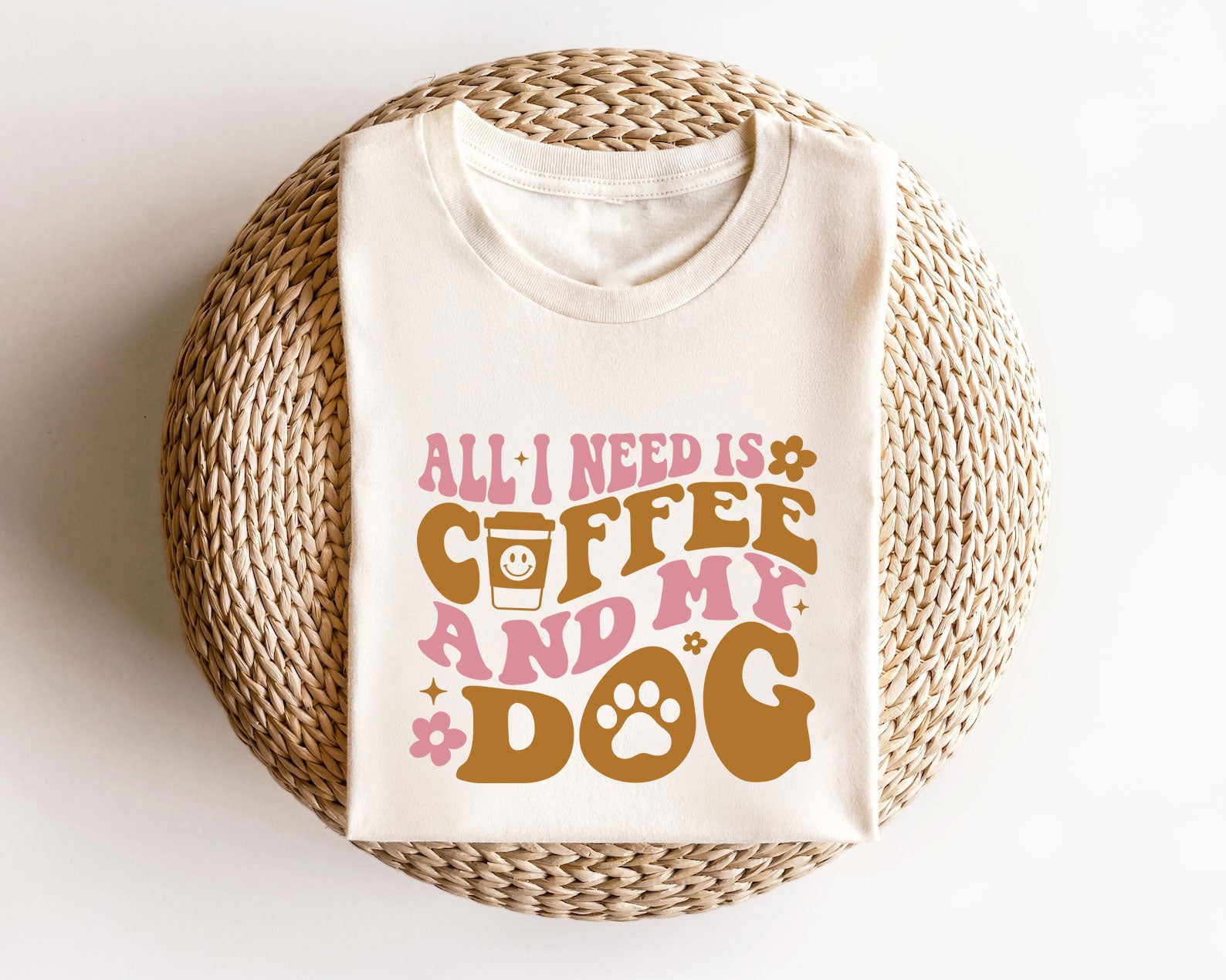 "All I Need is Coffee and My Dog" pink and brown ready-to-press DTF transfer for custom T-shirts and hoodies.