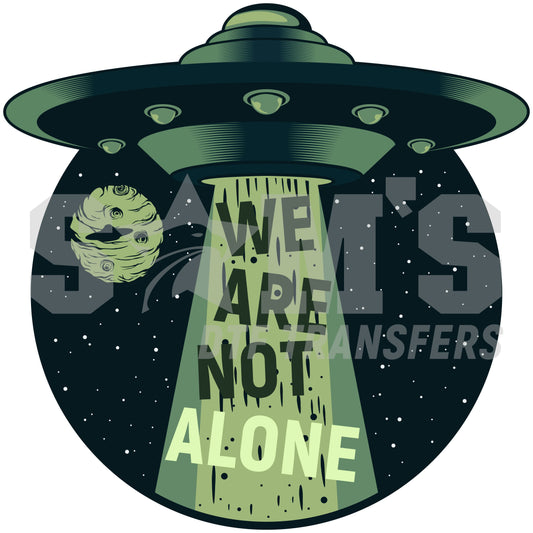 UFO emitting a beam with the message 'We Are Not Alone' and a planet in the background designed by Sam's DTF  Transfers